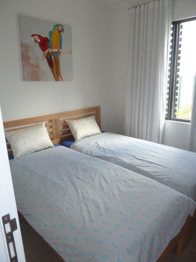 Apartamento Swiss Nest Travel Roches Noires Exterior foto